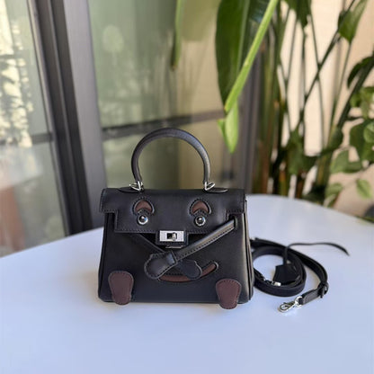 SEALBEER 2025 New niche design Kelly bag contrasting color mini first-layer cowhide doll bag single shoulder crossbody hand carrying smiley face bag