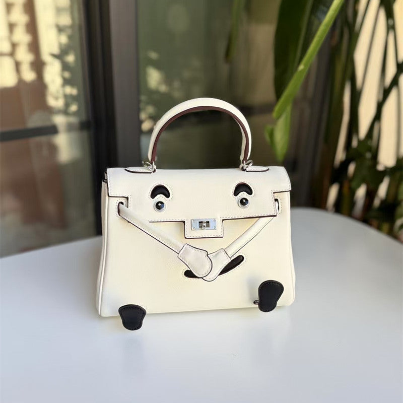 SEALBEER 2025 New niche design Kelly bag contrasting color mini first-layer cowhide doll bag single shoulder crossbody hand carrying smiley face bag