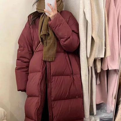 Out-of-season 2023 new Korean version winter big quilt down jacket women's medium and long models over the knee loose and thickened couple models